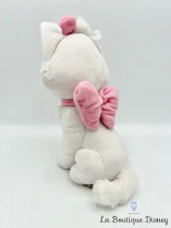 Peluche Marie Les Aristochats Disney Nicotoy Blanc Rose Chat Assis 25 Cm -Meilleur Jouets Magasin peluche marie les aristochats disney nicotoy chat banc noeud rose 0