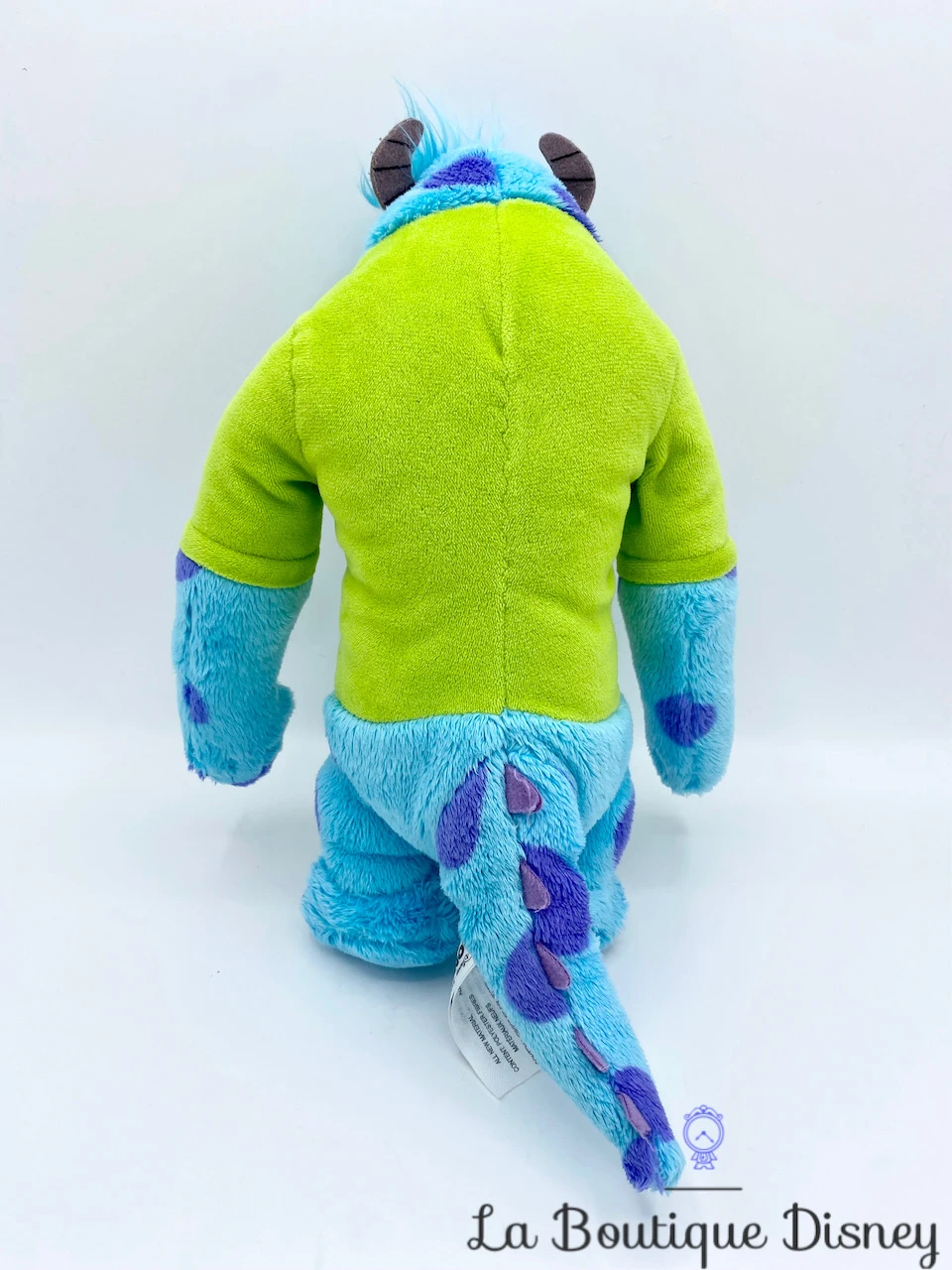 Peluche Sulli Ok Disney Monstres Academy University Monstre Bleu Violet Sully 28 Cm 6 Peluche Sulli Ok Disney Monstres Academy University Monstre Bleu Violet Sully 28 Cm – Image 4