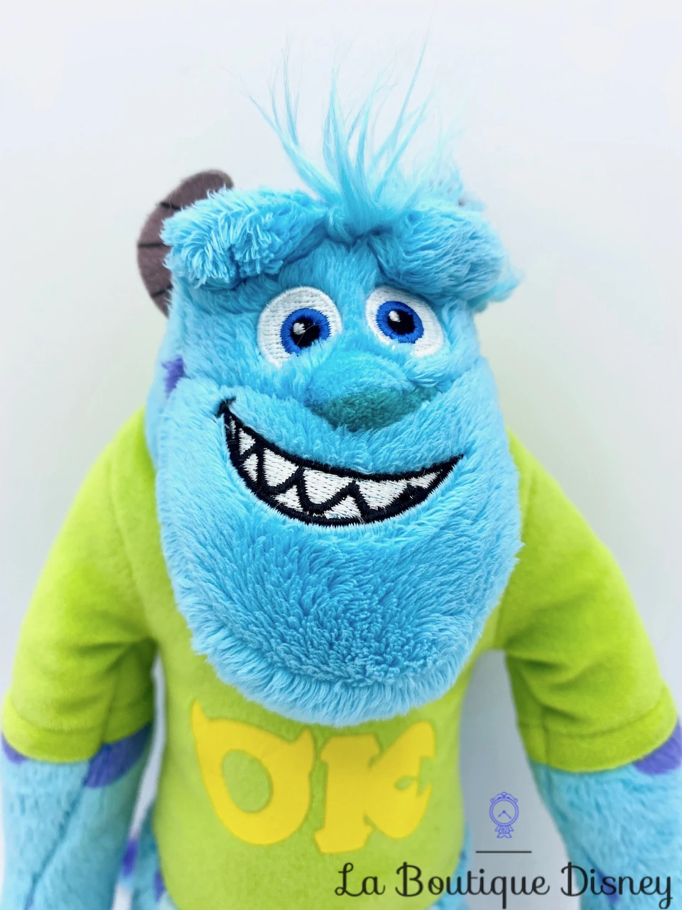 Peluche Sulli Ok Disney Monstres Academy University Monstre Bleu Violet Sully 28 Cm 4 Peluche Sulli Ok Disney Monstres Academy University Monstre Bleu Violet Sully 28 Cm – Image 2